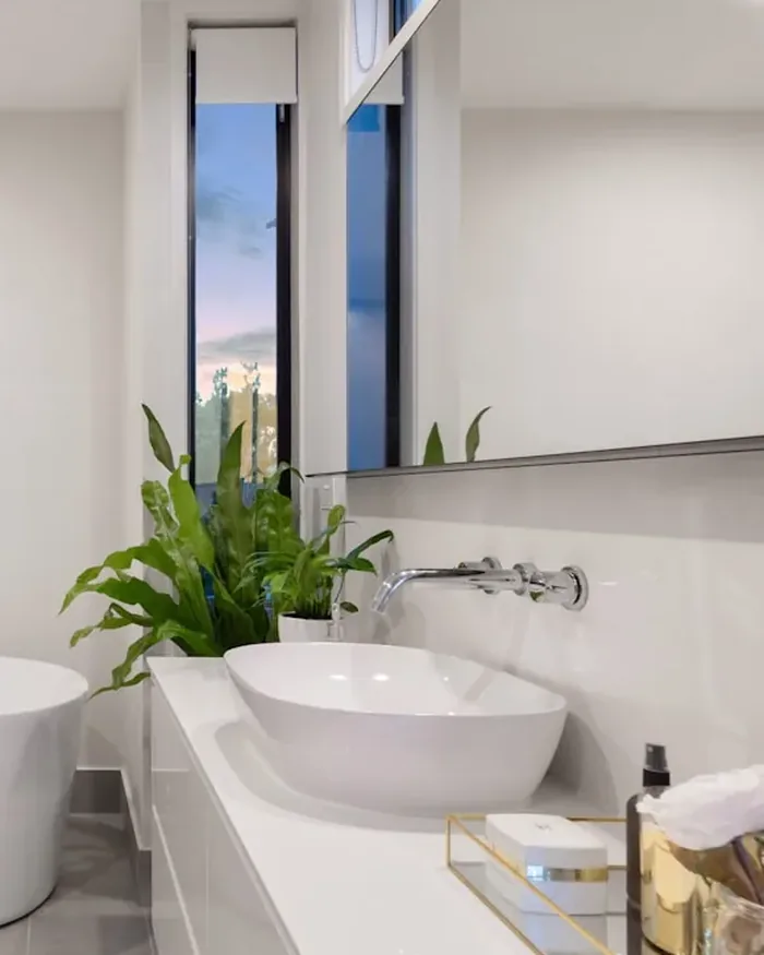Wall-mounted mixer and vessel basin — the quality level specified for Vasantara Skies bathrooms